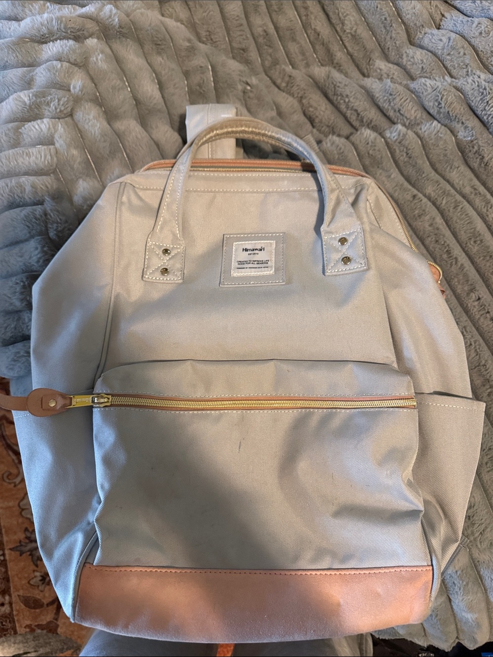 Light Beige Canvas Backpack with Tan Leather Accents